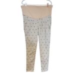 Damskie beżowe spodnie ciążowe ze wzorem w koty